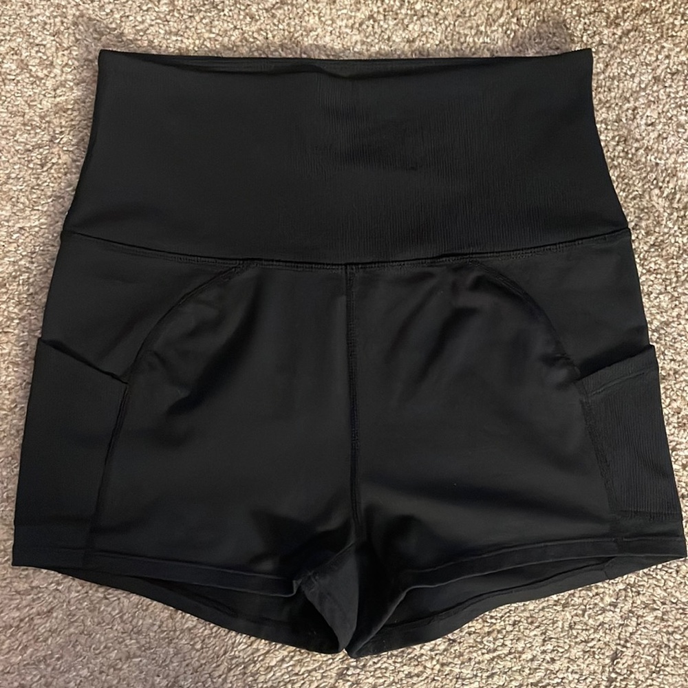 Free People high waisted shorts with side pockets on each side. Size medium